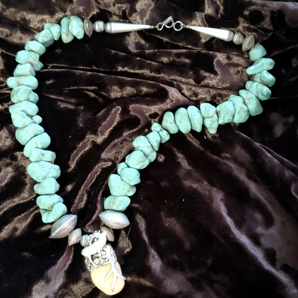 Turquoise and Sterling Silver vintage necklace. Approximately "17.